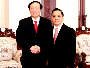 老挝总理通辛·坦马冯会见越南最高人民检察院院长阮和平